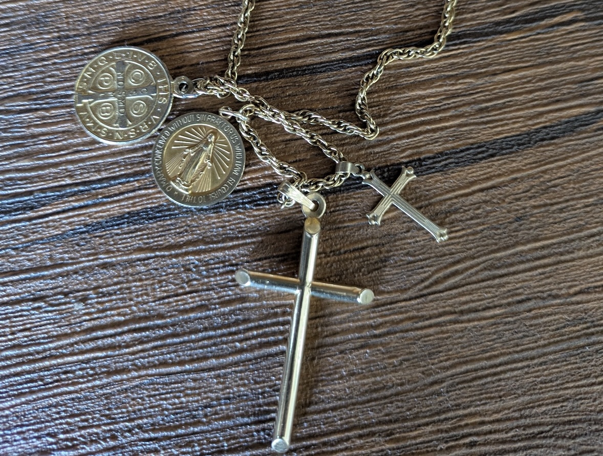 A gold chain with crosses and religious medals belonging to the Rev. Trish Vanni, who reflects on their meaning in her column.
Submitted photo
