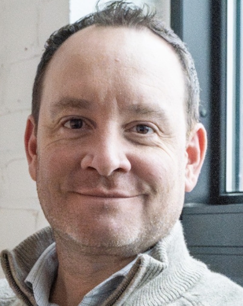 A closeup photo of Aaron Olivier, the new head boys lacrosse high school coach for Eden Prairie