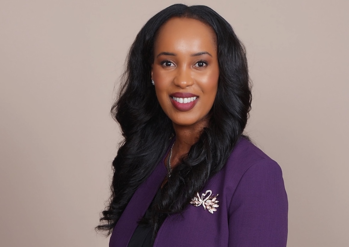 Ernise Beckel, owner of Caring Transitions in Eden Prairie, smiles in a professional portrait.