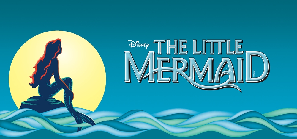 Logo of "The Little Mermaid." A mermaid with red hair sits on a rock, surrounded by the sea, and looks at the sky. The words "The Little Mermaid" are written in blue, sparkly letters.