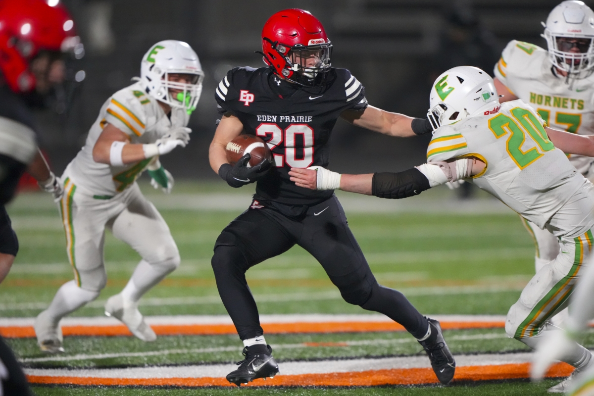 Eden Prairie sophomore running back Owen Konrad (20) led the Eagles with 95 yards on 19 carries and had two catches for 31 yards in the state quarterfinal game against Edina on Friday. Photo by Rick Olson